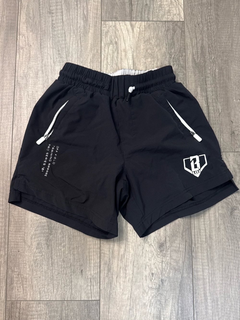 Black Baseball Lifestyle 101 Shorts with White Zip Accents